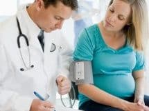 Спазмы внизу живота при беременности на поздних сроках