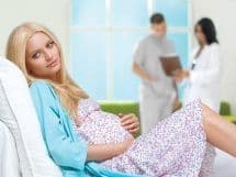 Режущая боль внизу живота у женщин при беременности