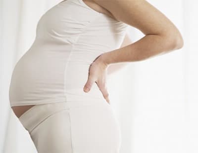 Что делать беременной при боли в пояснице