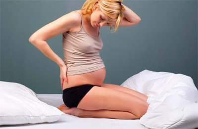 Что делать при болях в спине при беременности